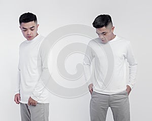 Young handsome man posing with white long sleeve t shirt suitable for mock up