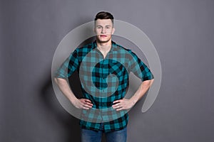 Young handsome man studio portrait, boy style