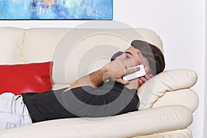 Young handsome man talking on the phone