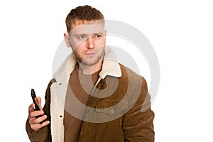 Young handsome man talking on a smartphone