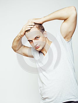 Young handsome man on white background gesturing