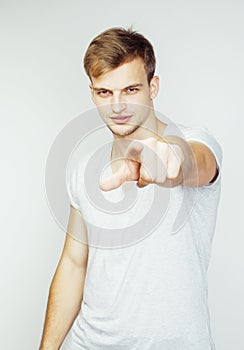Young handsome man on white background gesturing