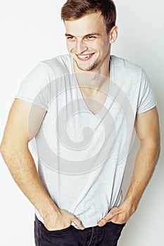 Young handsome man on white background gesturing