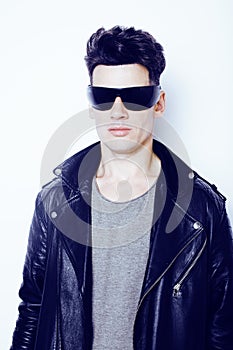 Young handsome modern man in sunglasses like robot, lifestyle fashion style people concept