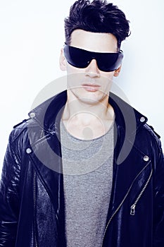 Young handsome modern man in sunglasses like robot, lifestyle fashion style people concept