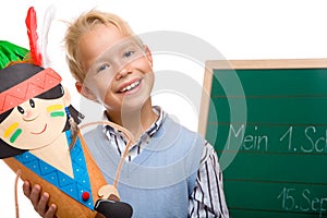 Young handsome schoolchild has first schoolday