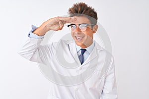 Young handsome sciencist man wearing glasses and coat over isolated white background very happy and smiling looking far away with