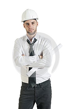 Young handsome technician holding rolled drawing plans on white