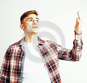 Young handsome teenage hipster guy posing emotional, happy smiling against white background isolated, lifestyle people