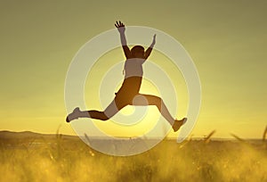 Young happiness woman jumping high