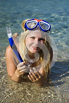 Young happy beautiful summer diving woman