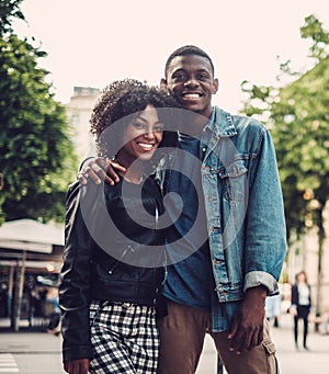 Young happy black couple outdoors