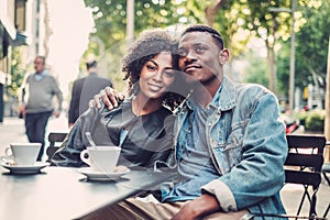 Young happy black couple outdoors