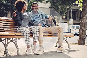 Young happy black couple outdoors