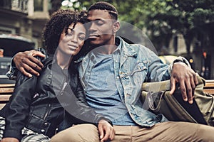 Young happy black couple outdoors