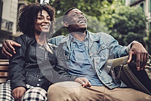 Young happy black couple outdoors