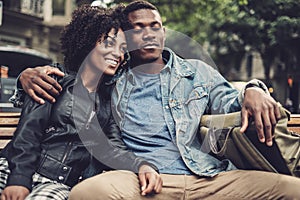 Young happy black couple outdoors