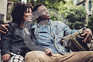 Young happy black couple outdoors