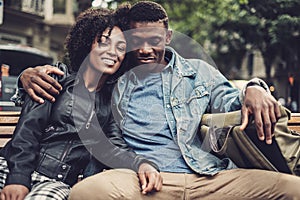 Young happy black couple outdoors