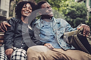 Young happy black couple outdoors