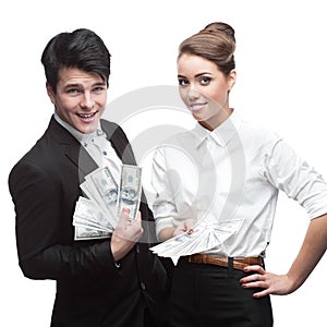 Young happy business people holding money