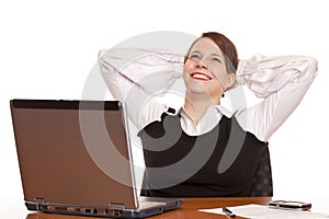 Young happy business woman relax in office