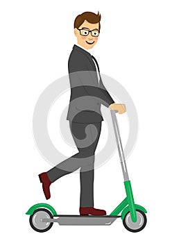 Young happy businessman riding his electric scooter isolated on white background