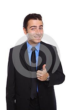 Young happy businessman with thumb up