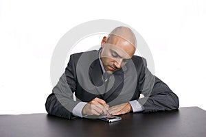 Young happy businessman, working at the desk