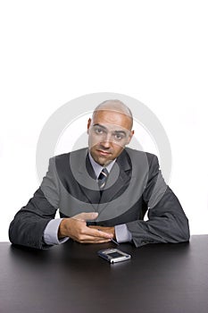 Young happy businessman, working at the desk