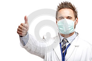 Young happy confident male doctor show thumb