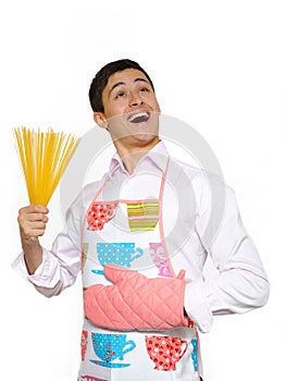 Young happy cook man with spagetti pasta photo