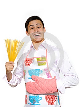 Young happy cook with spagetti pasta photo