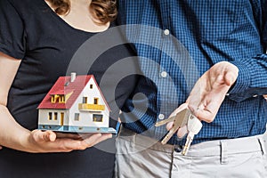 Young happy couple is buying new house