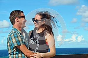 Young happy couple laughing on fun island vacation