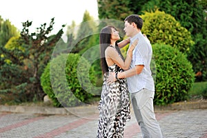 Young happy couple in love - outdoor portrait