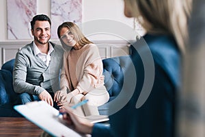 Young happy couple after therapy session with family psychologist