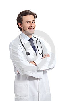 Young happy doctor man posing with folded arms smiling confident
