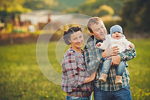 Young happy family having fun at countryside