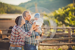 Young happy family having fun at countryside