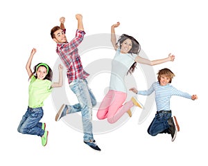 Young happy family jumping