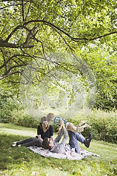 Young happy family playing