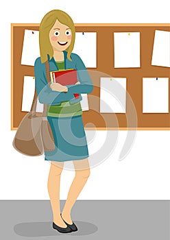 Young happy female student standing next to bulletin board