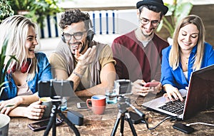 Young happy friends sharing content on streaming platform with digital web camera - Modern marketing concept with millenials photo