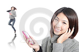 Young Happy Girl listen music with earphones