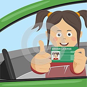 Young happy girl showing her new driver license sitting in the car and giving thumbs up