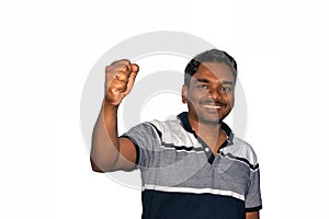 Young happy indian man wearing casual standing over isolated white background celebrating surprised and amazed for success with