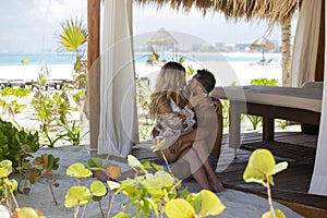 Young happy lovers on romantic travel honeymoon having fun on vacation summer holidays romance.