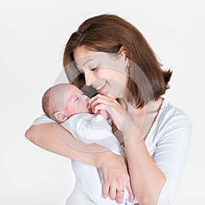 Young happy mother holding her newborn baby