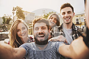 Young Happy People Have Fun Outdoors in Autumn.